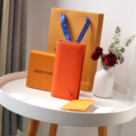 Louis Vuitton New Aerogram Brazza Wallet - Orange