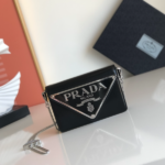 Prada Large Triangular Flip Cover Handbag - Black