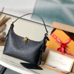 Louis Vuitton Sac Sport Monogram Empreinte Leather Handbag - Black